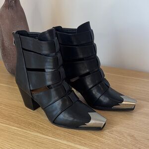 BUCKLE BEAST FASHION Black Leather Ankle Boots with Silver Accents